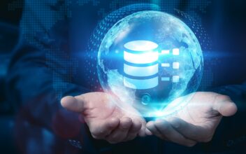 Businessman holds a global 'big data' sphere with a network connected to various industries, utilizing advanced big data analytics and business development technology to generate innovative ideas.